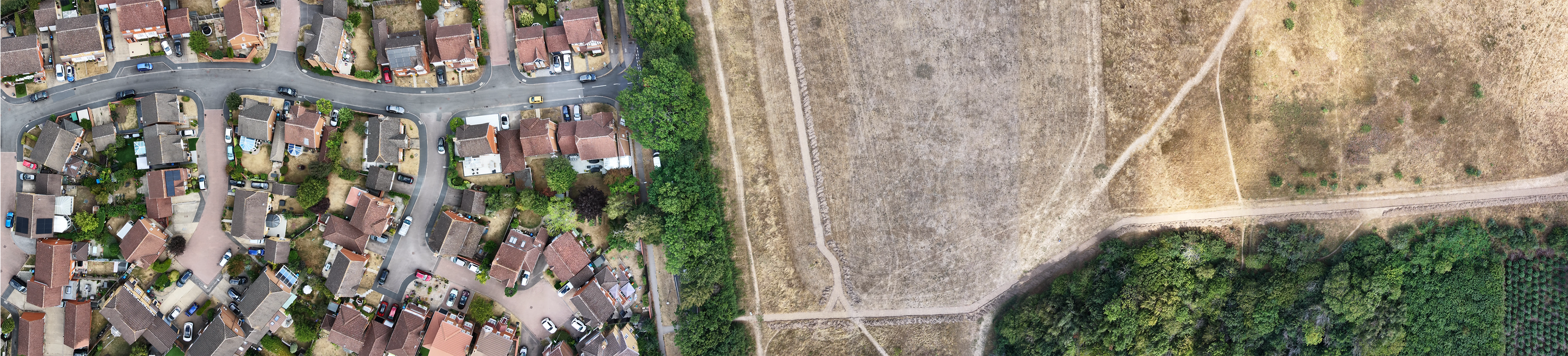 Urban-rural fringe orthomosaic showing transition from housing to fields